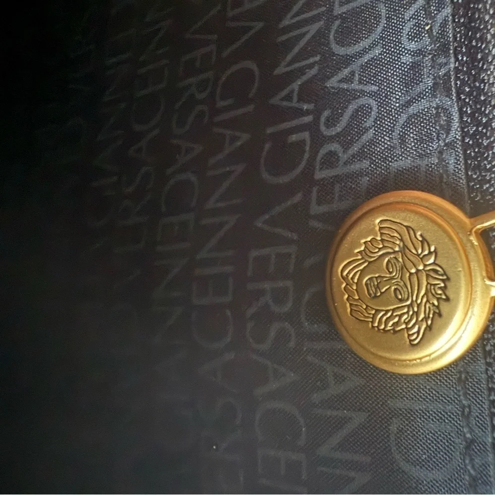 Versace Black and Gold Shoulder Bag with Classic Design